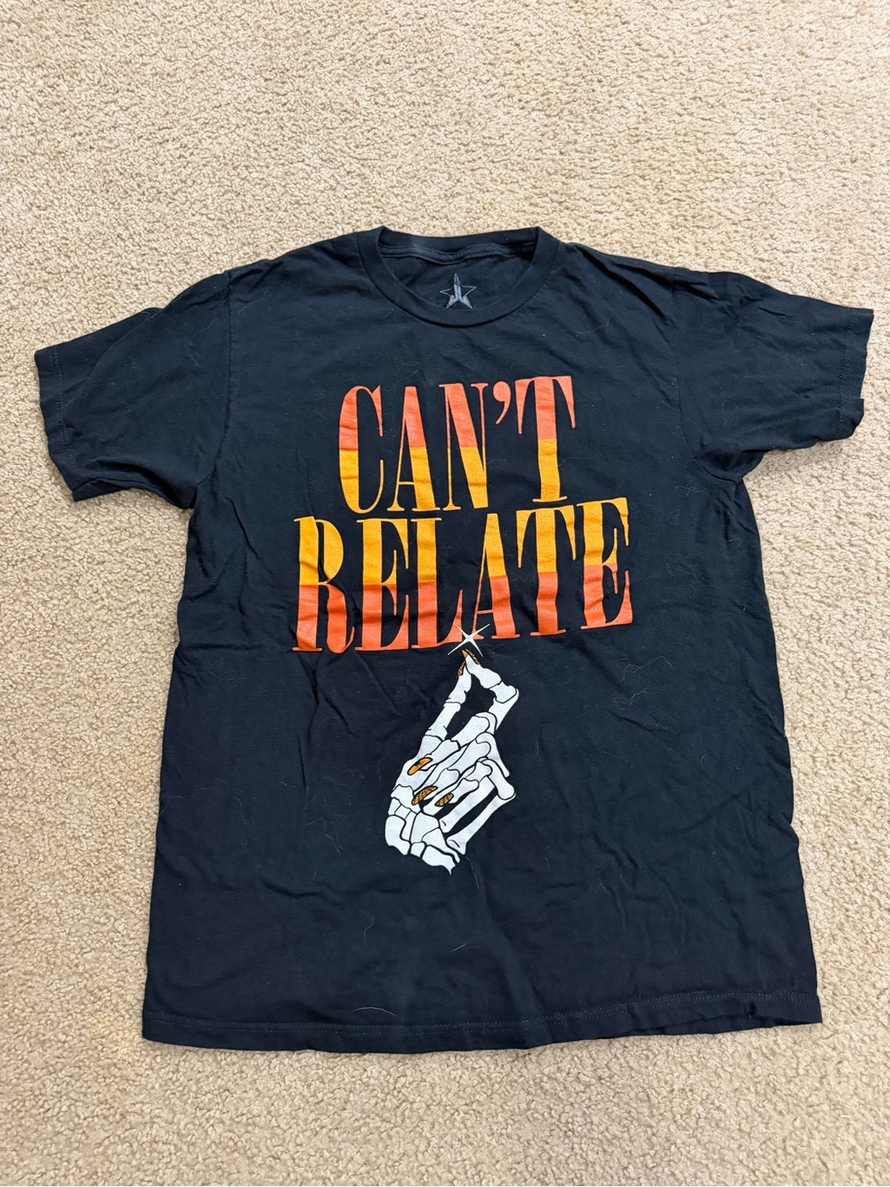 Jeffree Star Black Tee with Orange and Yellow "CAN'T RELATE" Graphic